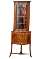 A late 19th Century George III style Inlaid mahogany corner display cabinet with astragal glazed