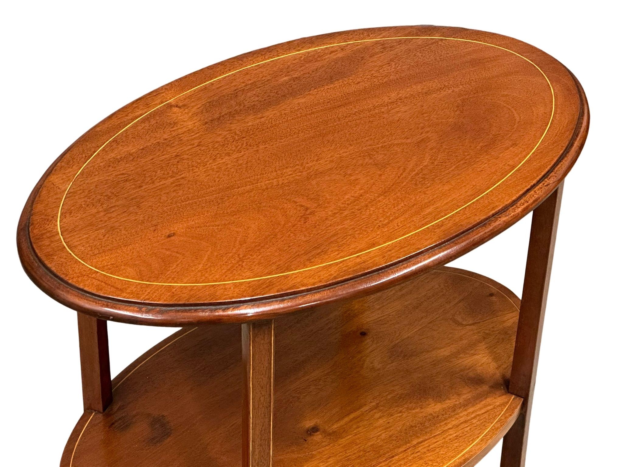 An Edwardian Inlaid 3 tier whatnot/side table on splayed feet. 58cm x 36cm x 76cm - Image 7 of 8