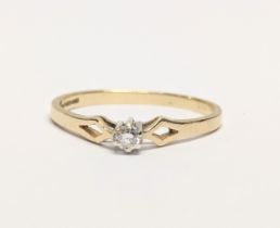 A 9ct gold and diamond ring. 1.36g. UK size M 1/2.