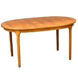 A McIntosh Mid Century teak extending dining table. Open 205x98x77cm. Closed 152x98x77cm