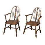 A pair of early 20th Century elm and beech Windsor style armchairs