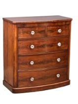 A large Victorian mahogany bow front chest of drawers with Victorian glass handles. 105x53.5x113cm