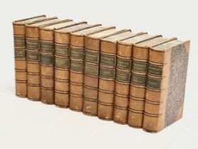 A set of 10 late 19th century Thackeray’s Works leather bound books. 1881.
