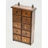 A late 19th century multi drawer chest. Circa 1890. 26x10x42cm