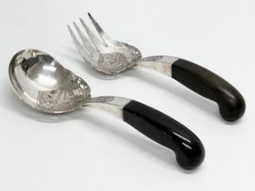 Malaysian silver. A pair of late 19th/early 20th century Malaysian silver serving tools with horn