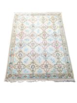 A large vintage rug. 370x270cm