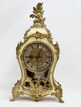 A large 19th century Louis XV style fusee mantle clock with gilt brass mounts. By Sharman D Neill,