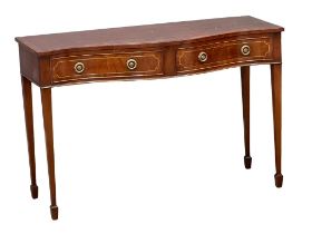 A Sheraton style brass inlaid mahogany serpentine front console table with 2 drawers.