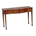 A Sheraton style brass inlaid mahogany serpentine front console table with 2 drawers.