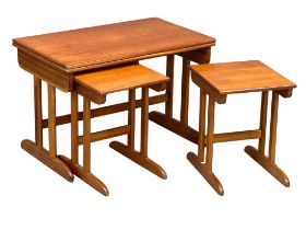 A Mid Century teak turnover coffee table with 2 nesting tables by Jentique, 83cm x 50cm x 54cm