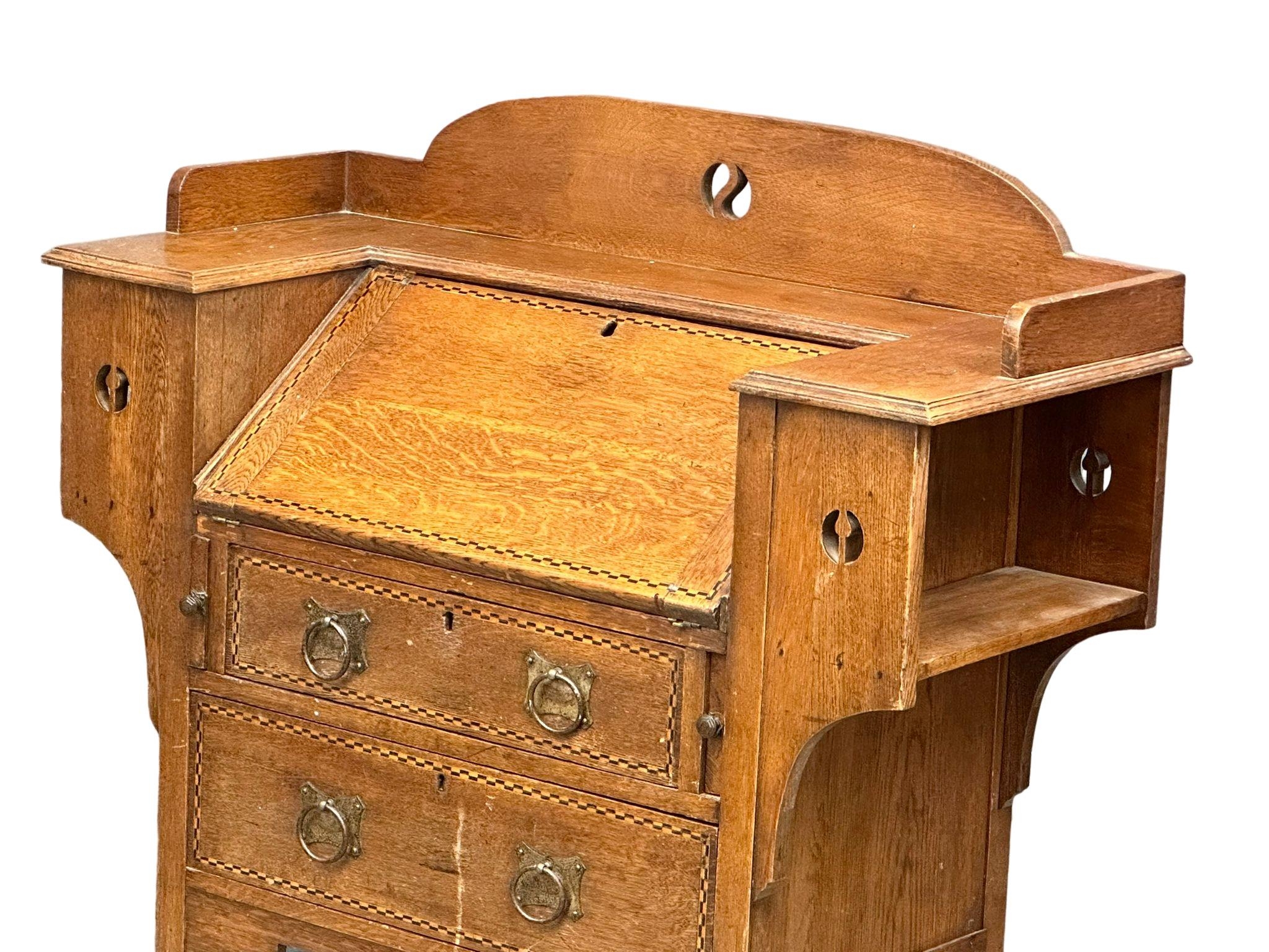 An early 20th century Art & Crafts inlaid oak writing bureau. Circa 1900. 99.5x41x111cm - Image 6 of 7