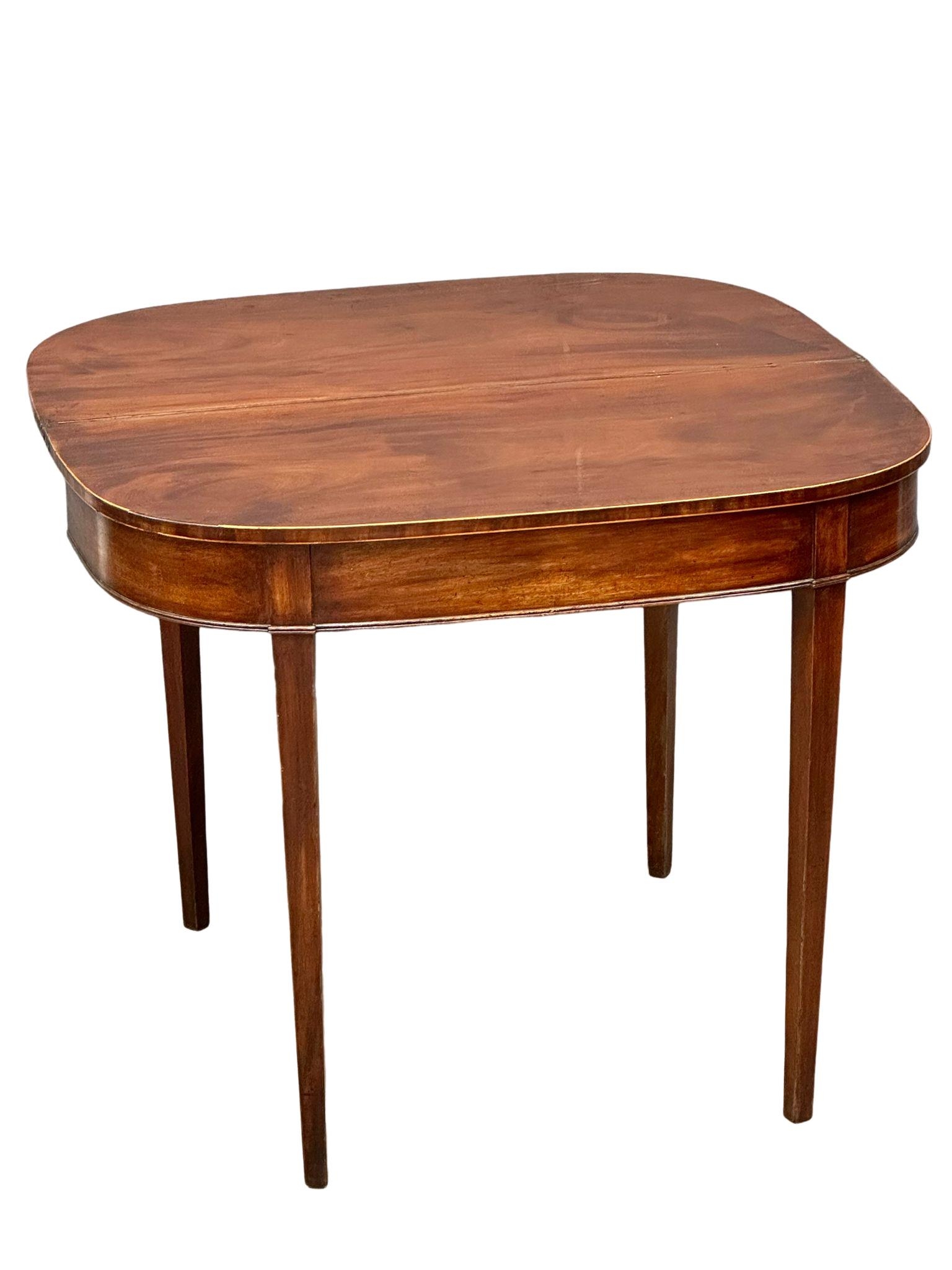 A George III inlaid mahogany turnover tea table. Circa 1800. 91x45.5x73cm - Image 2 of 6