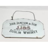 An early 20th century John Jameson & Son (JJ&S) Dublin Whiskey advertising mirror. 61x36cm