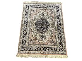 A Kashmir silk rug. 179x125cm