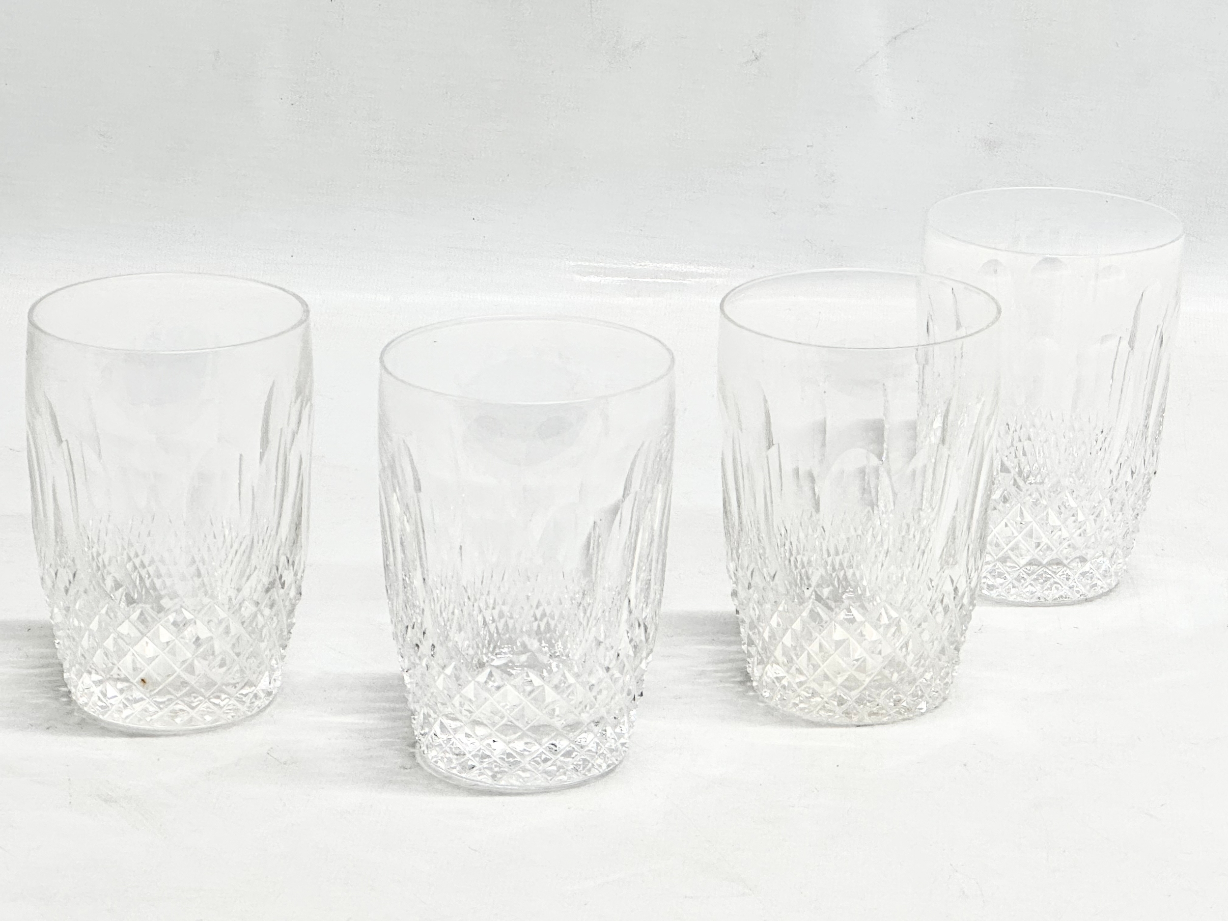 A set of 4 Waterford Crystal ‘Colleen’ whiskey glasses. 7.5x11cm