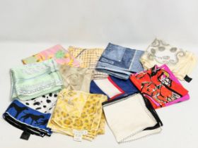 11 Escada silk scarves.