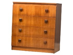 A Mid Century Tola Wood chest of drawers by Remploy. Circa 1960. 76x43x82cm