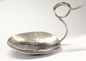 A silver spoon, stamped N. C. London, 1990. 40.6g