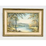 A large oil painting on board by Sylvia Hanger. A Wooded Lake. 58x35cm. Frame 74x51cm