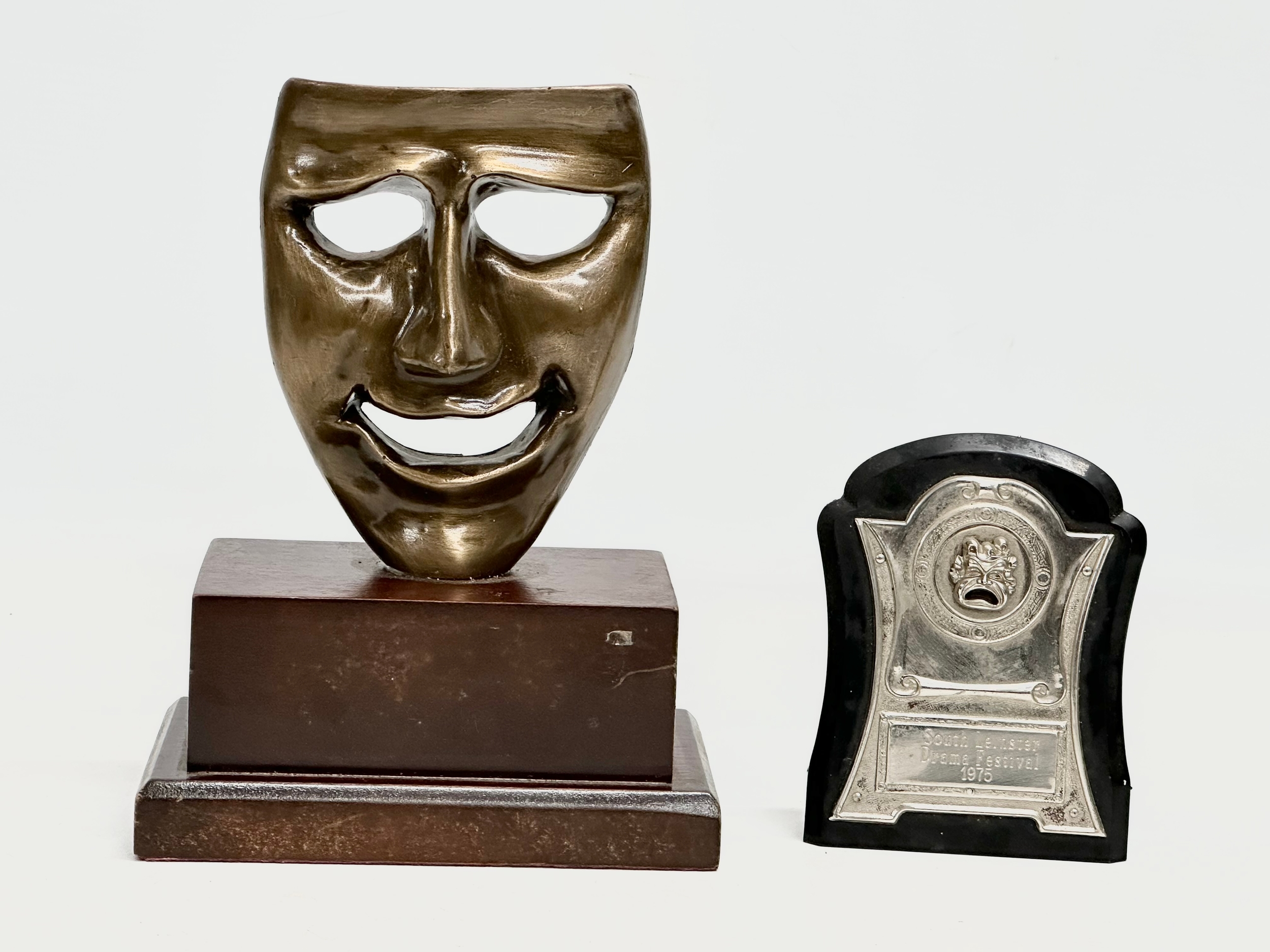 A South Leinster Drama Festival 1975 with a Tragedy Drama Mask on wooden stand. 15x9.5x20