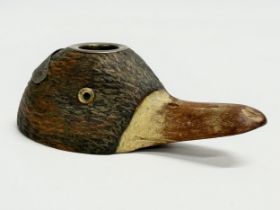 A late 19th century wooden Duck match holder and striker with glass eyes. 13cm