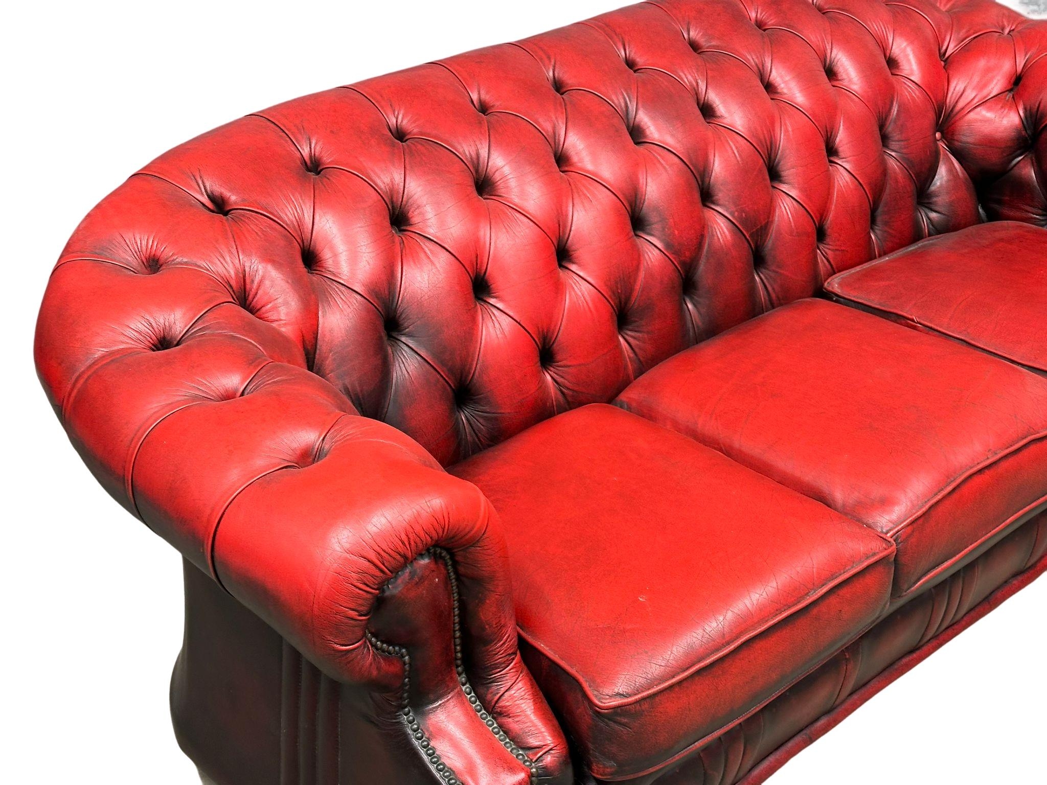 A deep buttoned ox-blood leather Victorian style 3 seater sofa. 207cm - Image 5 of 5