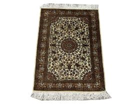 A good quality Kashmir Iranian silk rug. 103x173cm