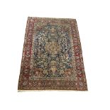 A vintage Persian style rug. 140x220cm