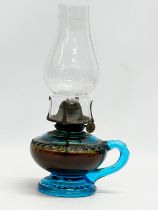 A late Victorian oil lamp/finger lamp. 15x28cm