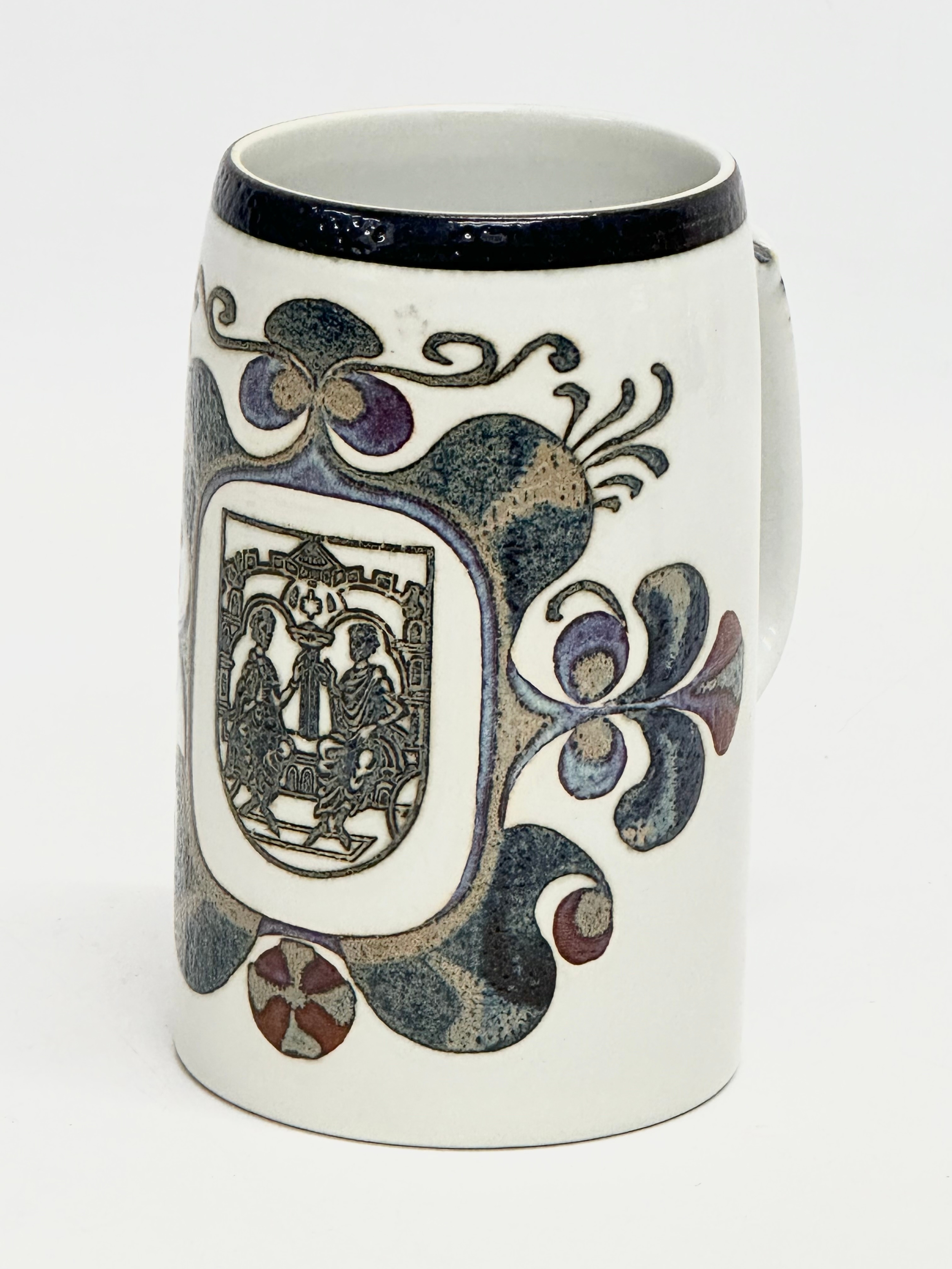 A Danish Mid Century Fajance mug designed by Nils Thorsson for Royal Copenhagen. Viborg Kruset
