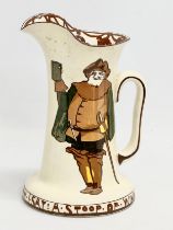 A 1930’s Royal Doulton Series Ware ‘Falstaff’ jug. 17x24cm