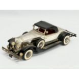 A vintage Rolls Royce Phantom battery operated car. 25cm