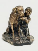 A bronze boy feeding dog figurine. Signed Schultz. 11x11cm