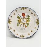 An Early 20th Century French enamelled plate depicting the French Revolution. La Liberte 1789. 23cm