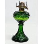 A Late 19th Century Bristol Green glass oil lamp. Circa 1890-1900. 25cm