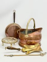 A quantity of Late 19th and Early 20th Century copper and brass. An Early 20th Century copper coal