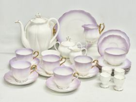 A quantity of Royal Albert tea ware. A 20 piece Royal Albert ‘Rainbow’ tea service with a Royal