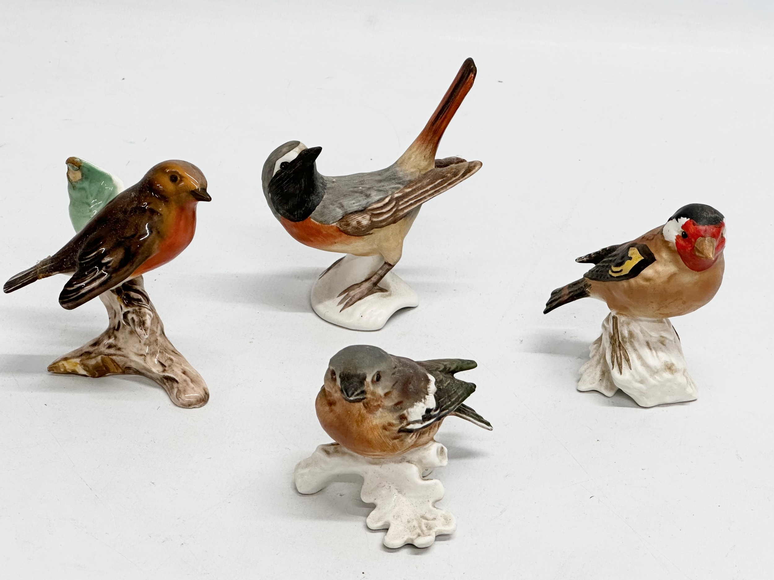 A collection of Goebel pottery birds. - Image 4 of 5