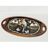 A Mid 20th Century Brazilian serving tray with Mother of Pearl parrot and butterfly design. 70x41cm