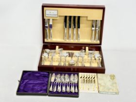 An Arthur Price canteen of cutlery with 2 vintage cutlery sets. 46x30.5x11cm