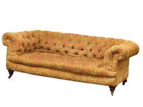 A superb quality large late 19th century Victorian deep button chesterfield sofa, on turned walnut