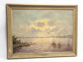 A large signed oil painting. 70x50cm. Frame 82x62cm