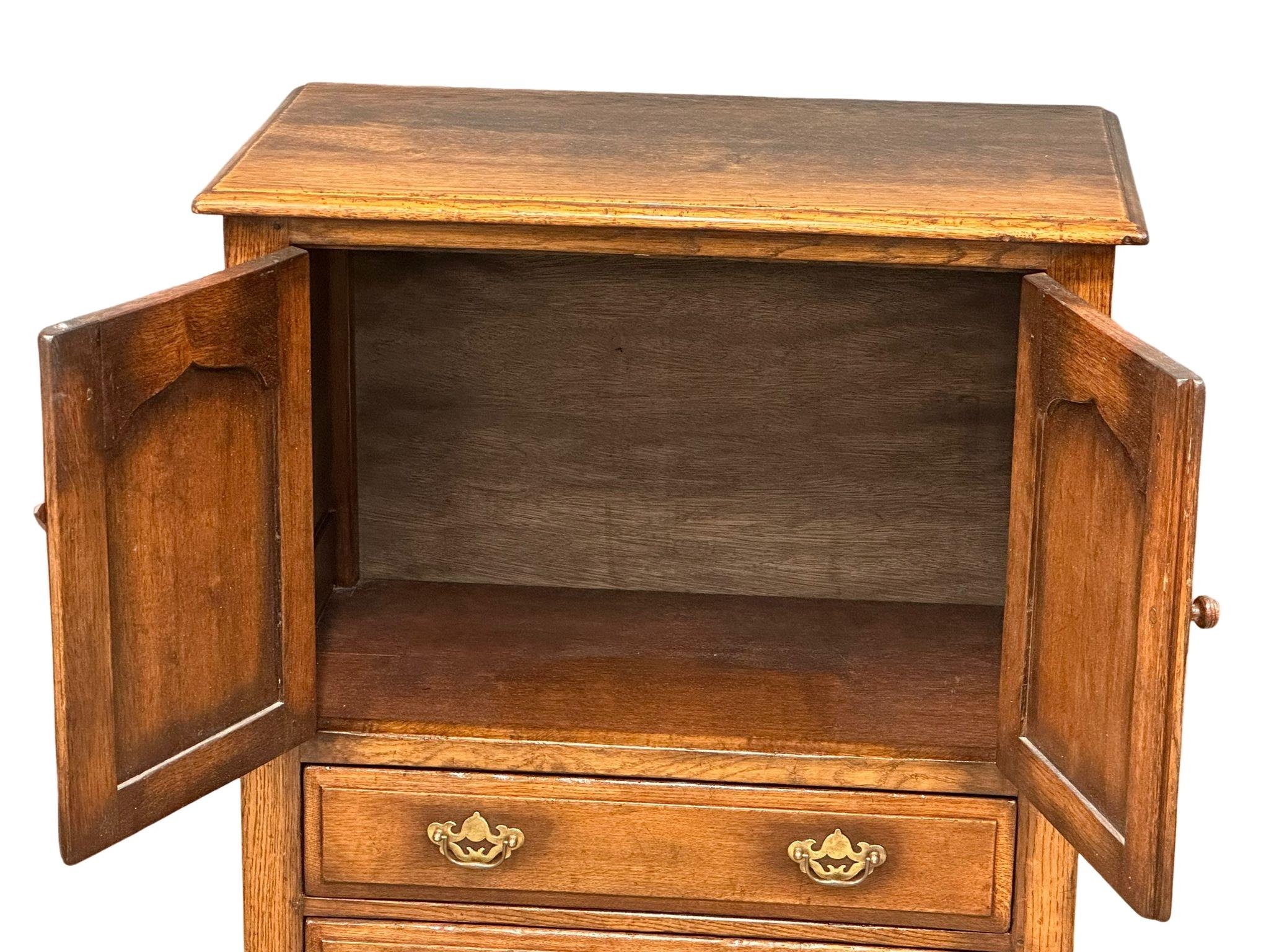 A George III style Ipswich oak side cabinet. 81x47x103cm - Image 3 of 4