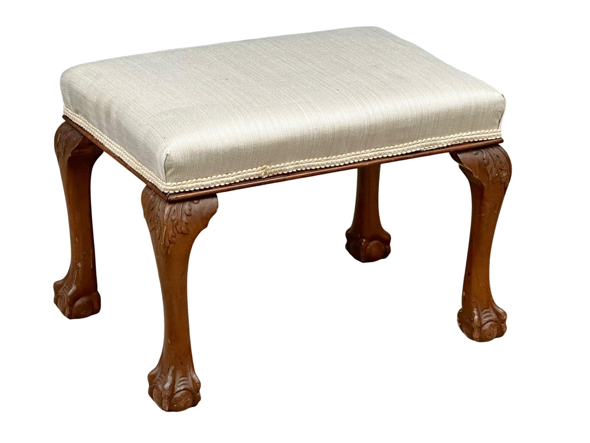 A Late 19th Century Chippendale Revival mahogany footstool. Circa 1890.