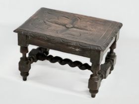 A Late 19th Century Victorian carved oak stool. Circa 1880-1890. 29x20x19cm