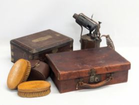 A job lot including a Early 20th Century leather case, tin, etc.