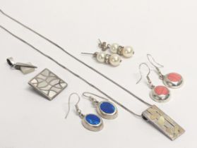 A quantity of silver items, including a necklace, 3 pairs of earrings, 2 pendants.