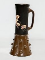 An Early 20th Century Bretby Pottery jug. 24.5cm