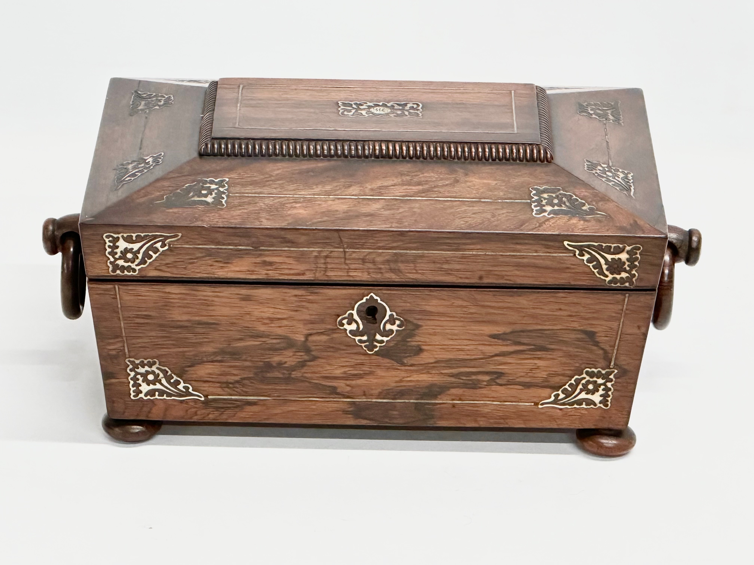 A Regency rosewood and Mother of Pearl sarcophagus shaped sewing box. Early 19th Century. Circa - Image 2 of 7