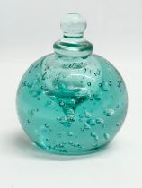 A Victorian glass paperweight inkwell with stopper. 9x11cm